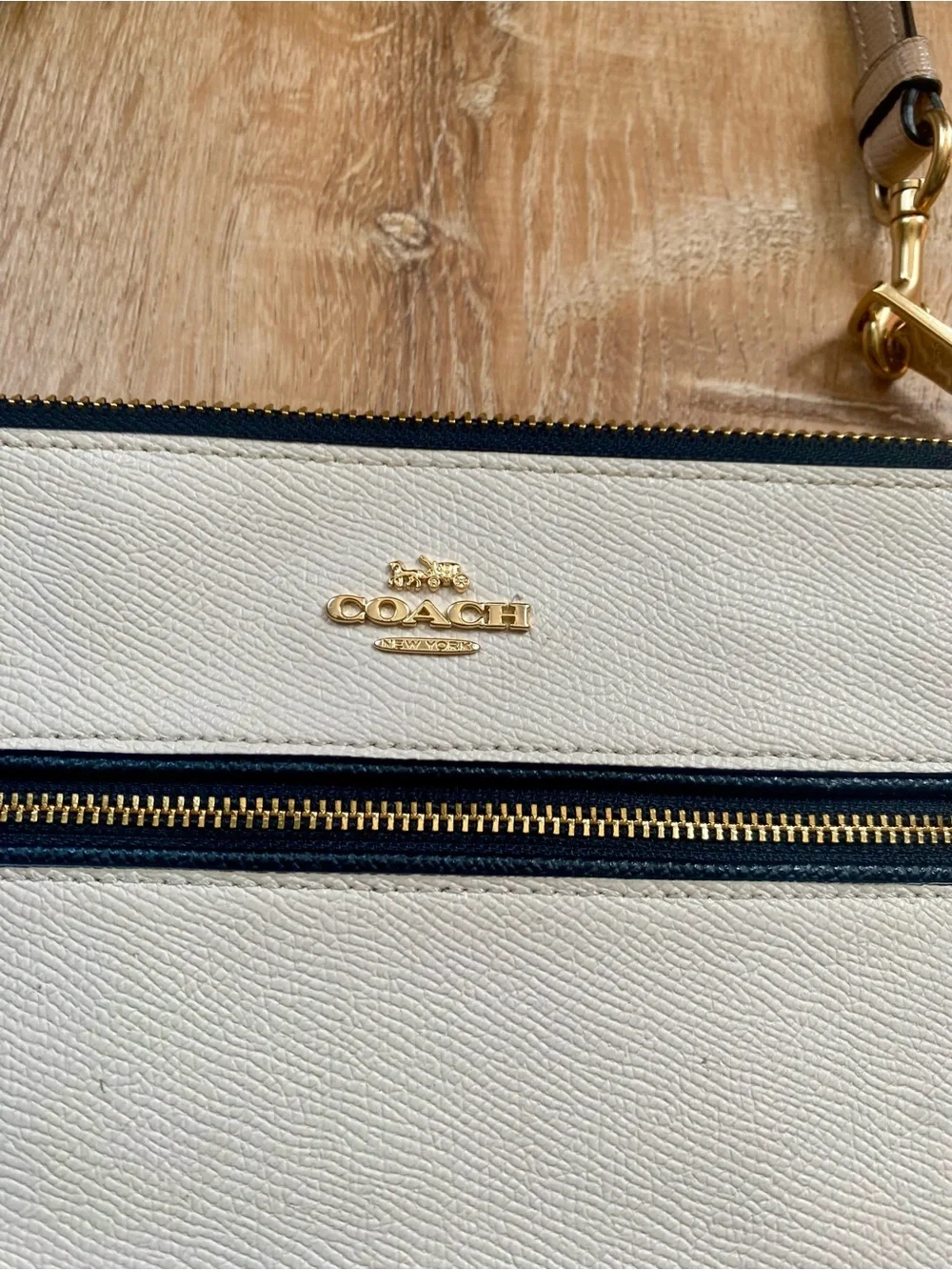 Coach Cream and Black Zip Wristlet
